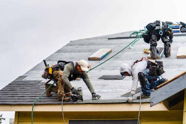 Professional Gutter Installation technician working in Hunter, OK